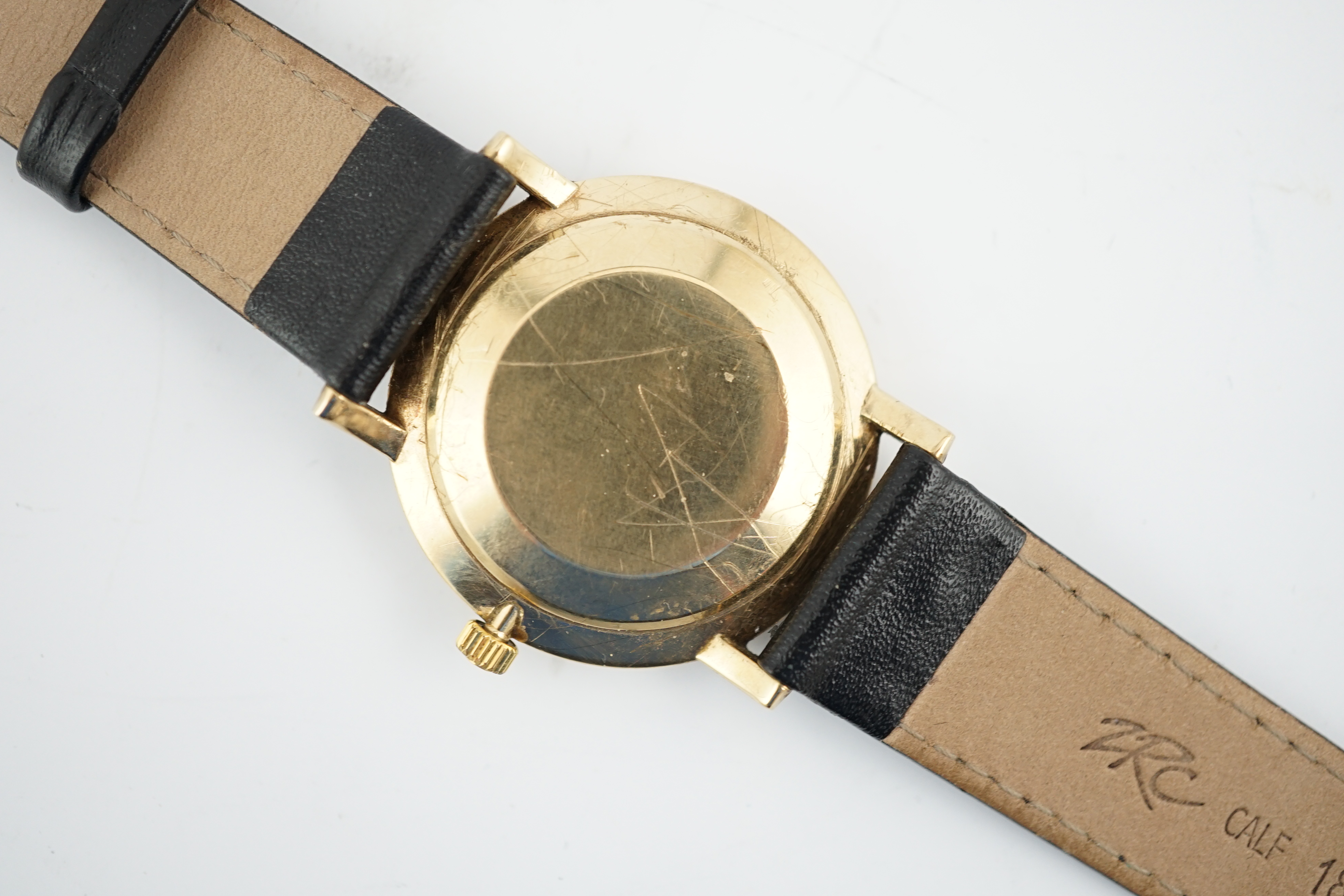 A gentleman's gold Omega manual wind wrist watch